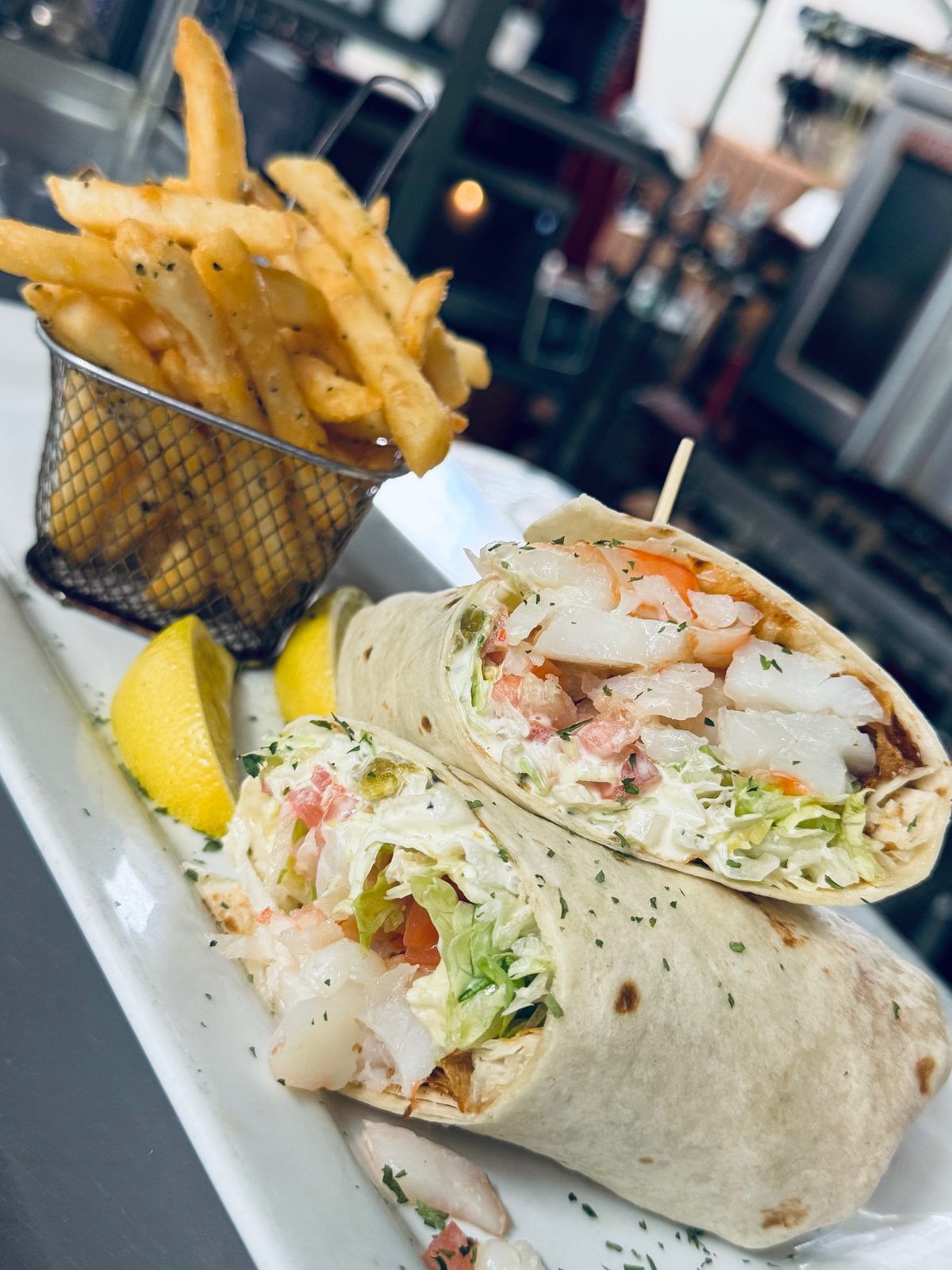 Fish and shrimp wrap with fries